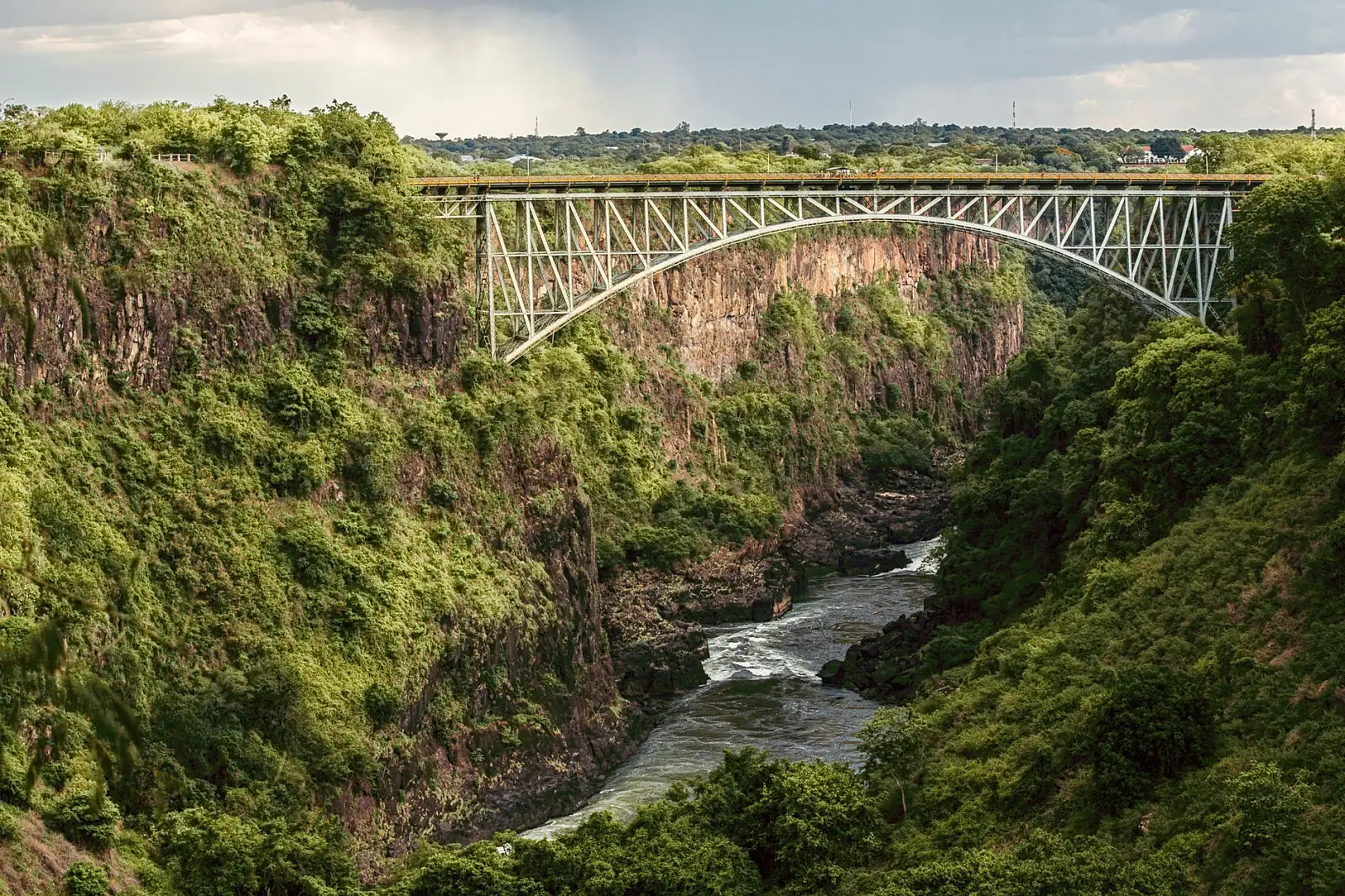 A private ridge above the Wild Horizons Wildlife Sanctuary, a short drive from Victoria Falls town, Zimbabwe, with views of the Batoka Gorge and the falls' spray