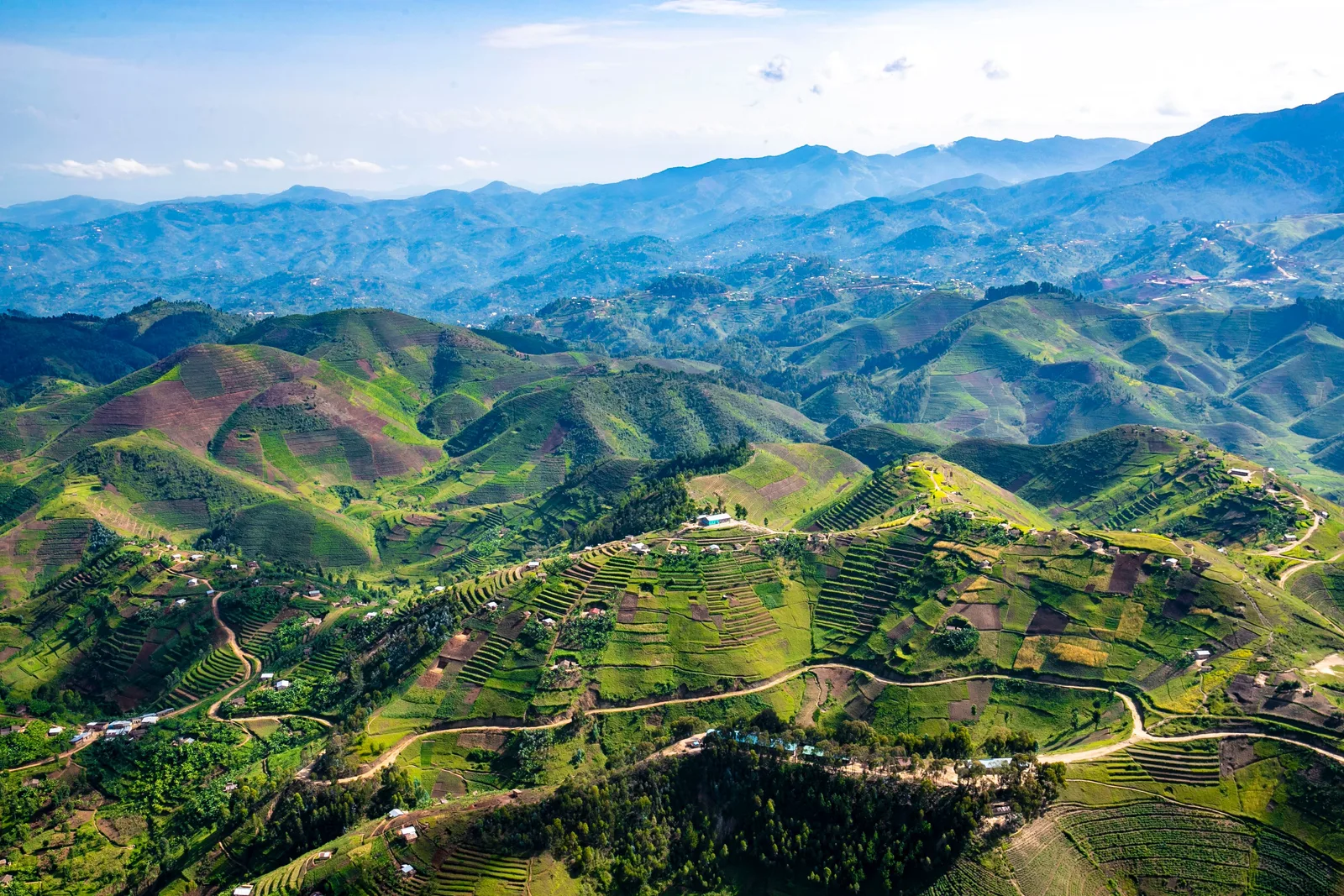 Aerial view of Rwanda's terraced green hills, the "land of a thousand hills".